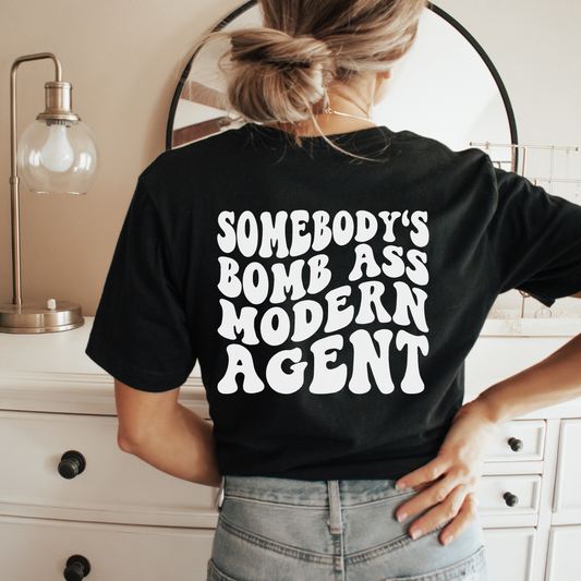 Somebody's Bomb Ass Modern Agent Tee 1