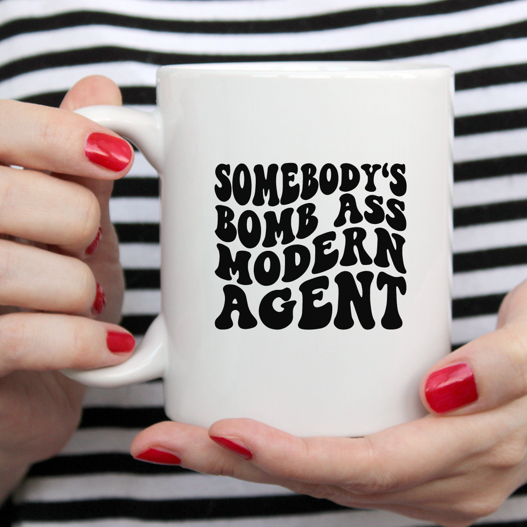 Somebody's Bomb Ass Modern Agent Mug